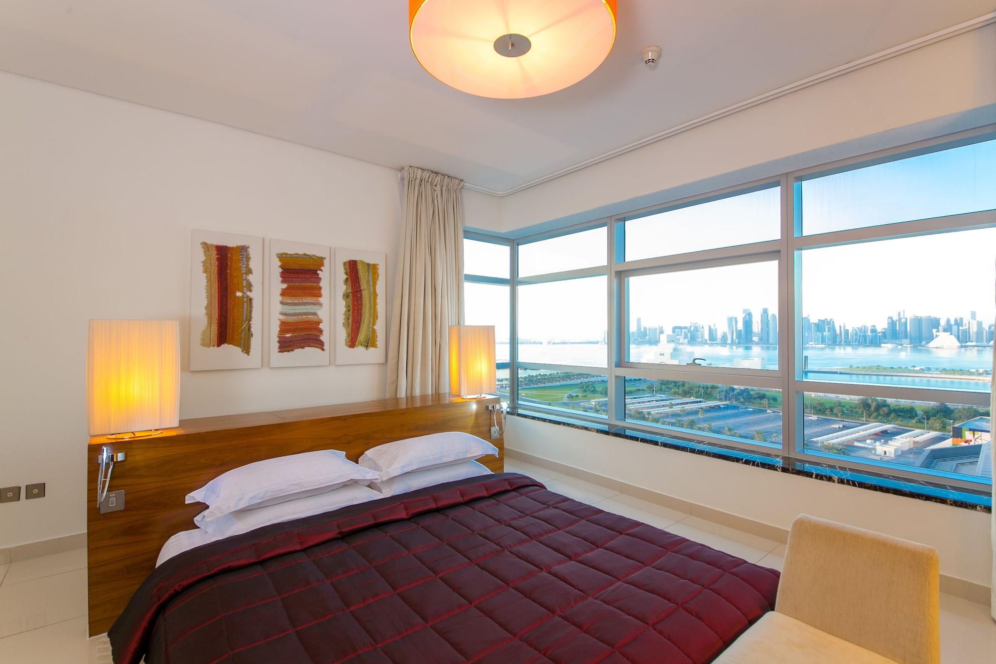 프레이저 스위트 도하 아파트 호텔 외부 사진 A bedroom at the Marina Bay Sands