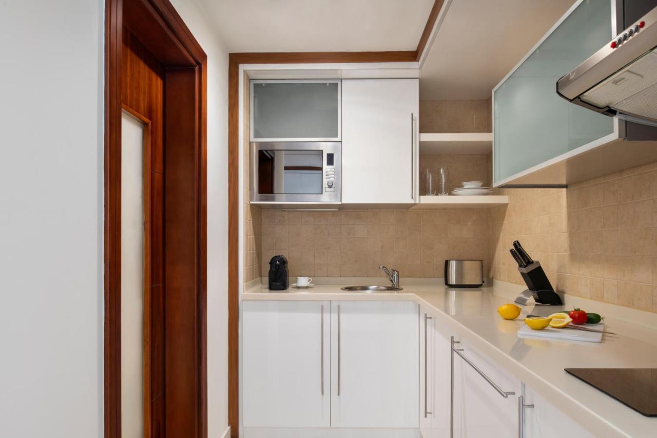 프레이저 스위트 도하 아파트 호텔 외부 사진 A typical kitchen