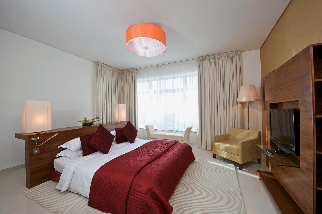 프레이저 스위트 도하 아파트 호텔 외부 사진 A bedroom at the hotel